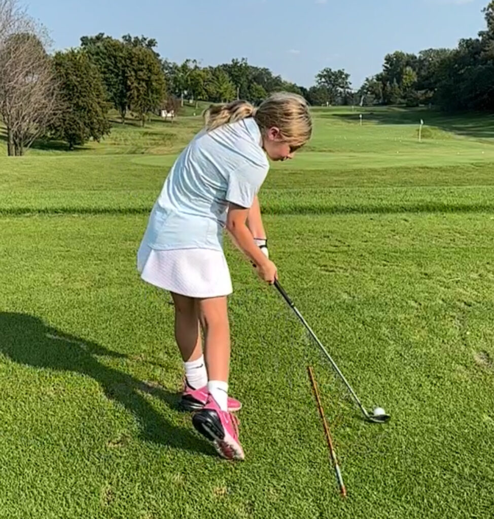 Leah Mack hitting a great iron shot.